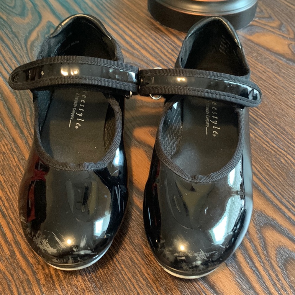 Black patent tap shoes with Velcro st